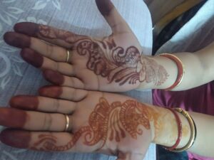 simple mehndi design featuring floral and vine patterns for special occasions